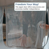 Portable crib with mesh zipper door for easy access and toddler independence.