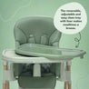 Green baby highchair with removable tray and liner