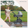 Mother pushchair Cool Grey Nebula Stroller through park